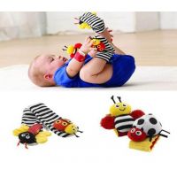 Educational rattles on the legs and handles of the company Lamaze buy in online store
